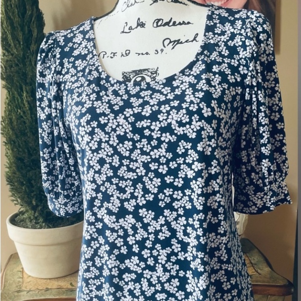 $16. or 2/$18. 
“CeCe” Blue and White Top Size Small.  On Sale Now!
EUC